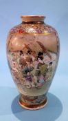 A Satsuma vase decorated with figures. 15cm height