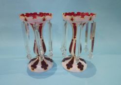 A pair of Victorian lustres on a red and white flashed ground, each with 6 clear drops. 29cm height