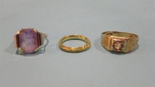A 9ct ring, an 18ct ring and 1 other unmarked (3)