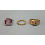 A 9ct ring, an 18ct ring and 1 other unmarked (3)