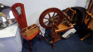An Ashford spinning wheel and chair