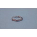 An 18 ct white gold half hoop diamond eternity ring stamped 750 ( NOT PLATINUM)