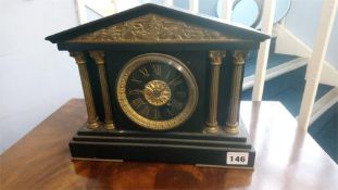 A Victorian slate mantel clock