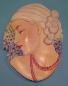 A Beswick Art Deco wall mask of a lady, printed mark, number 8137 and impressed number 436. 31cm
