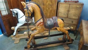 A carved wood rocking horse, 'Special Millennium Limited edition to mark year 2007, serial no.130 of