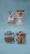 A Lladro figure, two Royal Worcester tea caddies and a Worcester Cathedral appeal goblet. (4)
