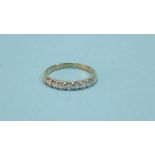 A 9ct gold diamond half hoop eternity ring