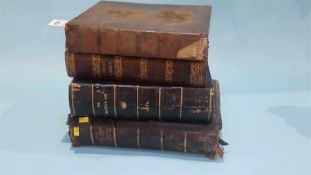 Four leather bound religious books