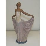 Lladro bisque figure, modelled as a dancer with ou