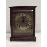 Four glass mahogany cased mantel clock, quarter ho