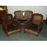 Early 20th century oak three piece suite comprisin