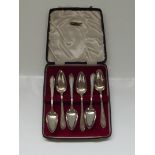 Cased set of six silver grapefruit spoons , Sheffi