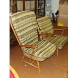 Two blonde Ercol armchairs