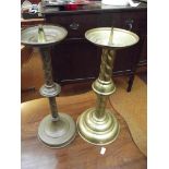 Two early church brass candle sticks