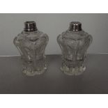 Two silver rimmed scent bottles