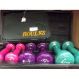 Set of boules together with lady's weights