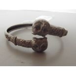 800 grade silver bangle, the ends depicting owl's