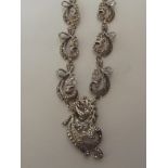 Ornate necklace stamped silver