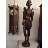 Very large ethnic carved figure