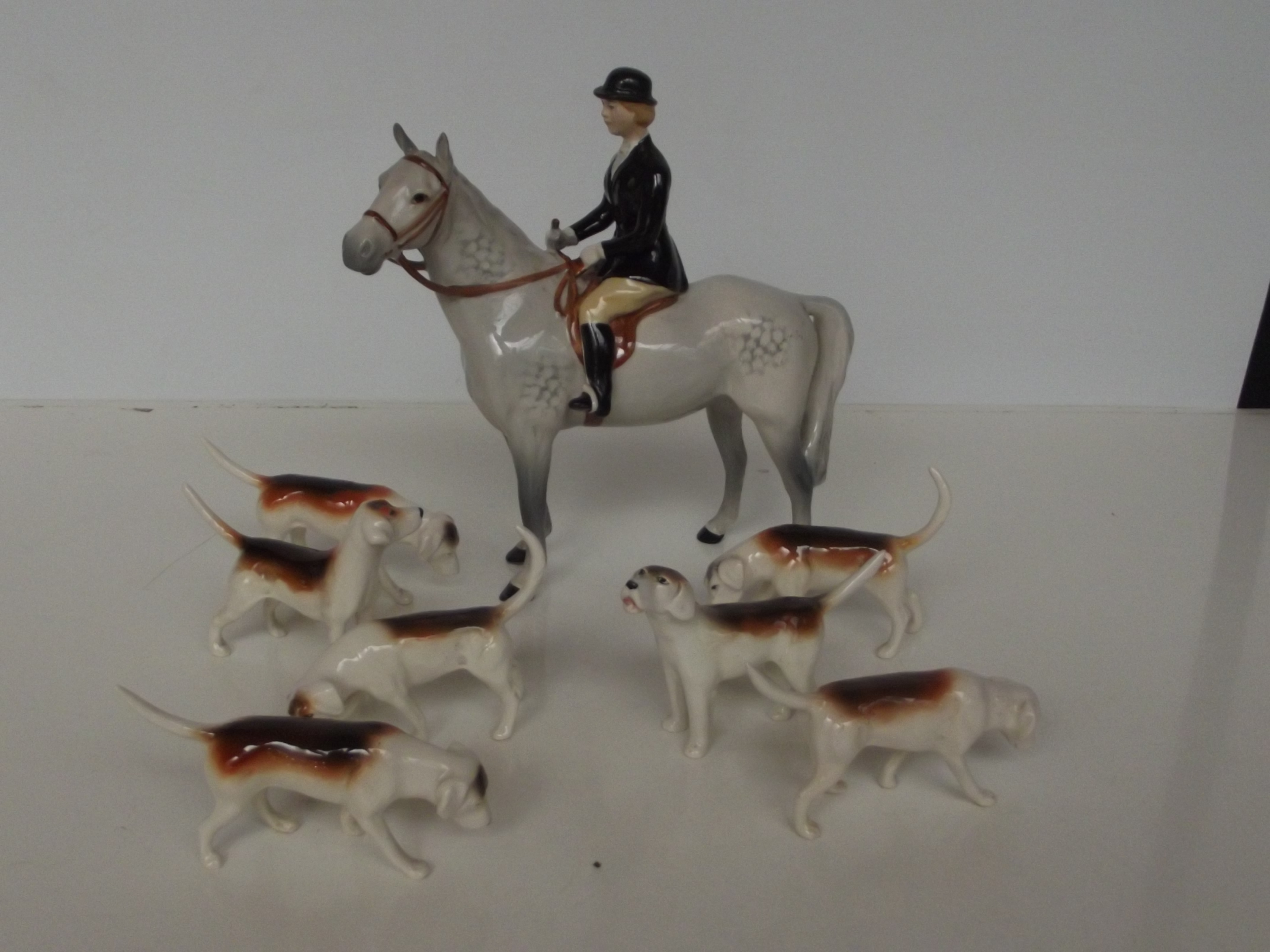 Beswick huntswoman and seven hounds