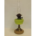 Early 20th century oil lamp, ceramic base, green g