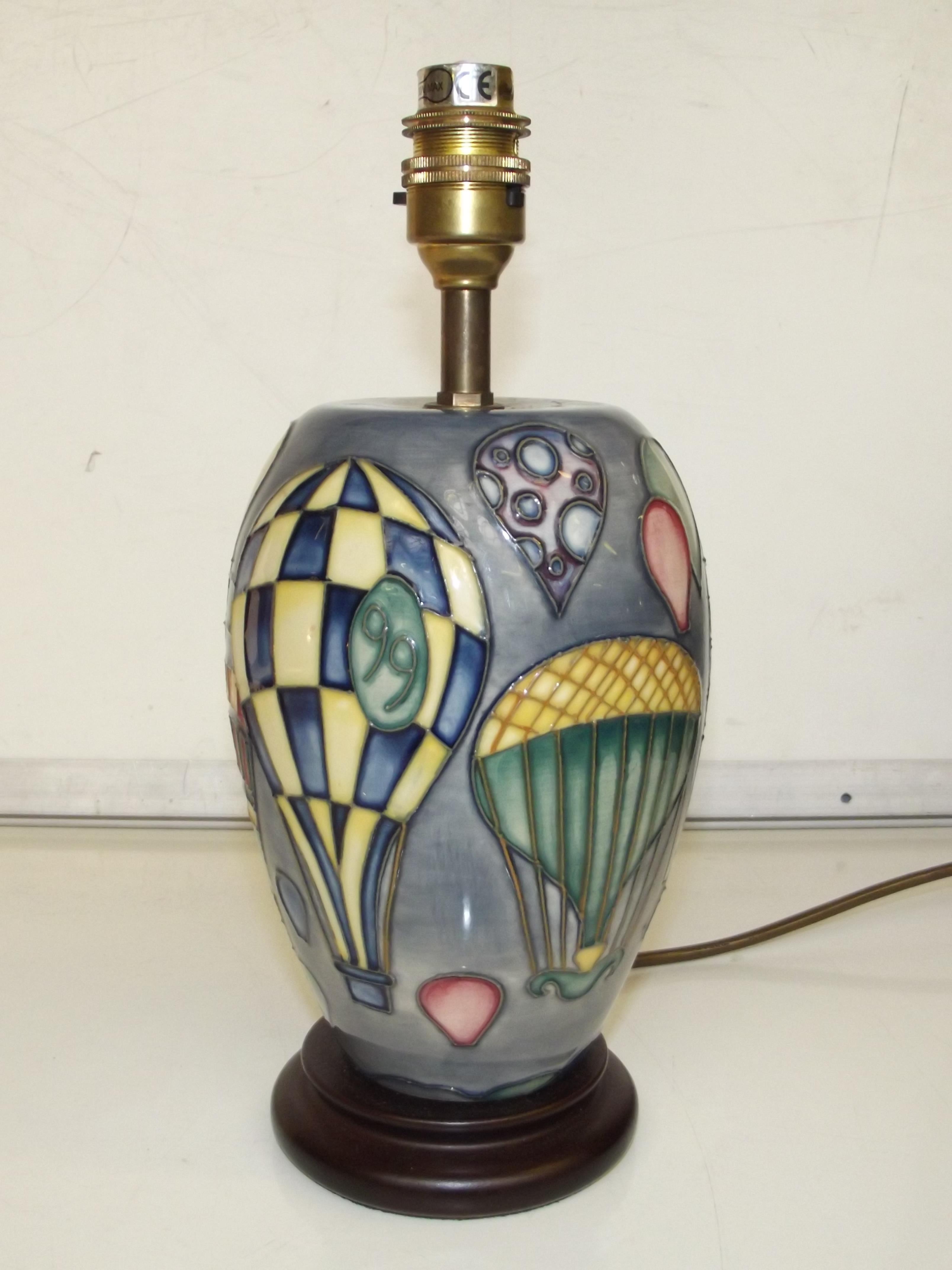 Moorcroft table lamp tube lined depicting various