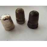 3 silver thimbles