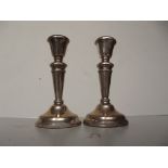 Pair of Silver dwarf candle sticks