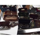 Collection of 8 cased vintage spectacles