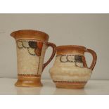 Two Crown Ducal jugs in the Charlotte Reed style,