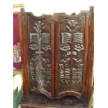 Early carved corner cupboard