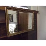 Large gilt frame bevelled mirror with etched decor