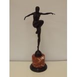 Bronze art deco figure on marble stand, height 57c