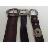 Three leather belts