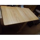 Drop leaf light wood breakfast table