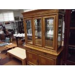 Large light wood display cabinet