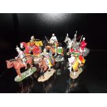 Nine Del Prado figures on horseback
