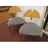 Pair of modern designer chairs with aluminium fram