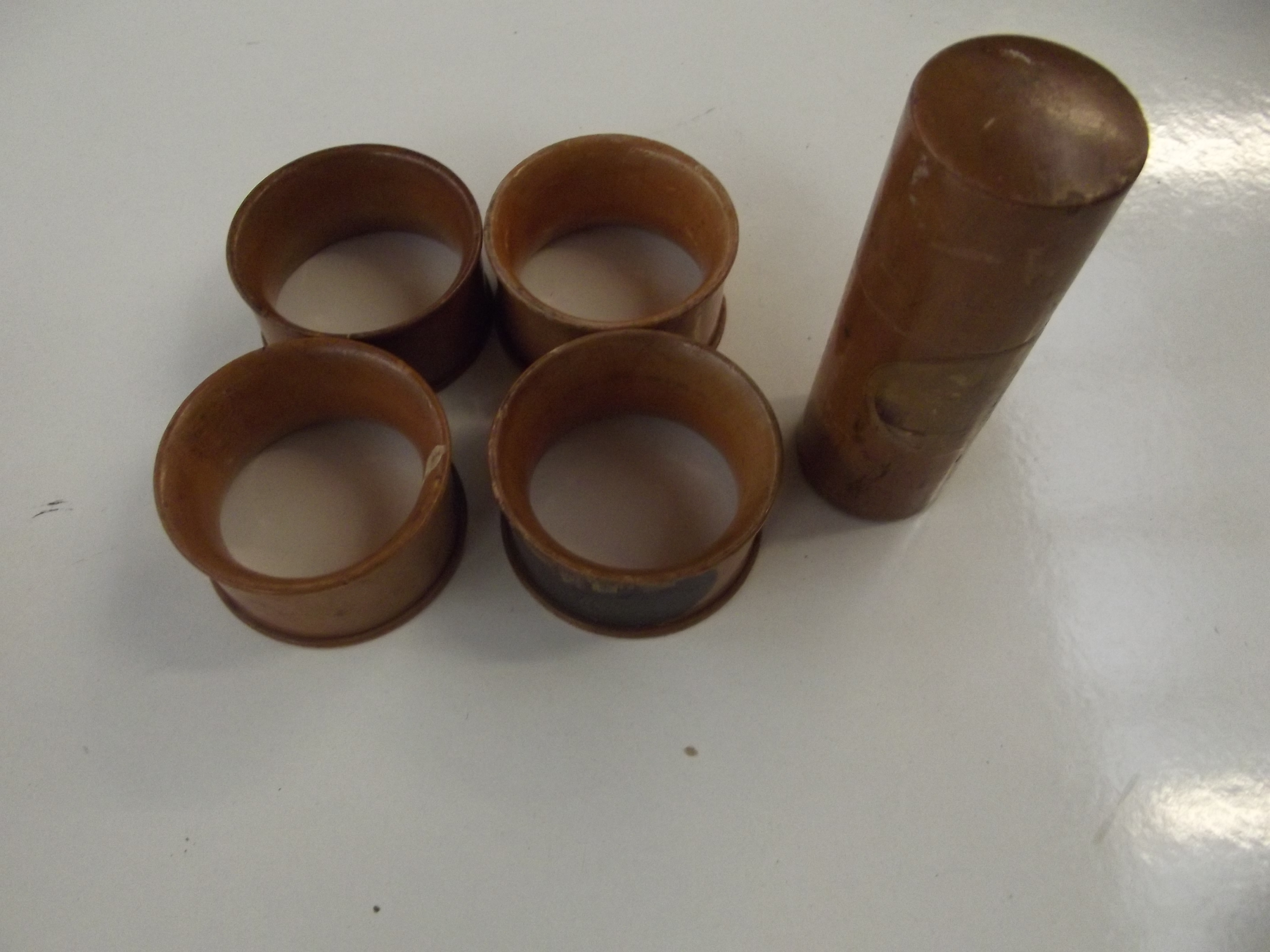 Mauchline ware napkin rings and needle case