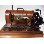 Cased Singer sewing machine