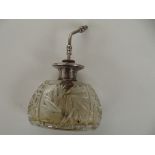 Silver top perfume bottle