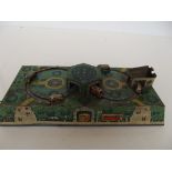 Early tin plate mechanical toy