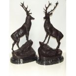 Pair of bronze stags on marble bases, height 72cm