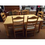 Large light wood dining table and 6 chairs