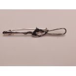 Silver stamped horse riding crop brooch
