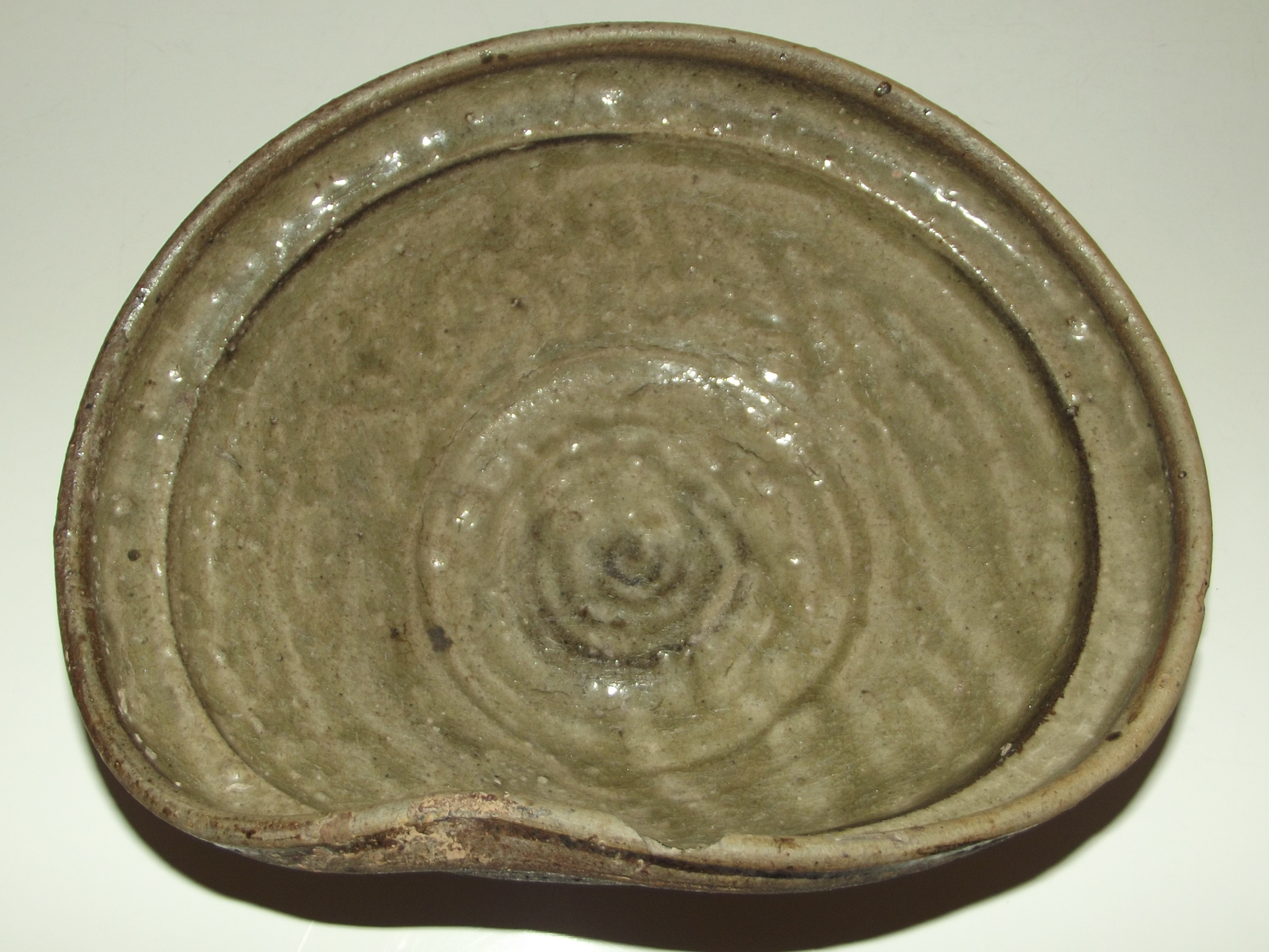 Chinese Fujian province celadon bowl, misshaped in