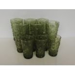 Set of 12 green glasses with original paper packing, by E. Korvette of 5th Avenue New York, note;