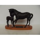 Beswick Black Beauty and foal 20cm on a plinth