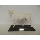 Beswick "Spirit of freedom" on wooden plinth. 20cm