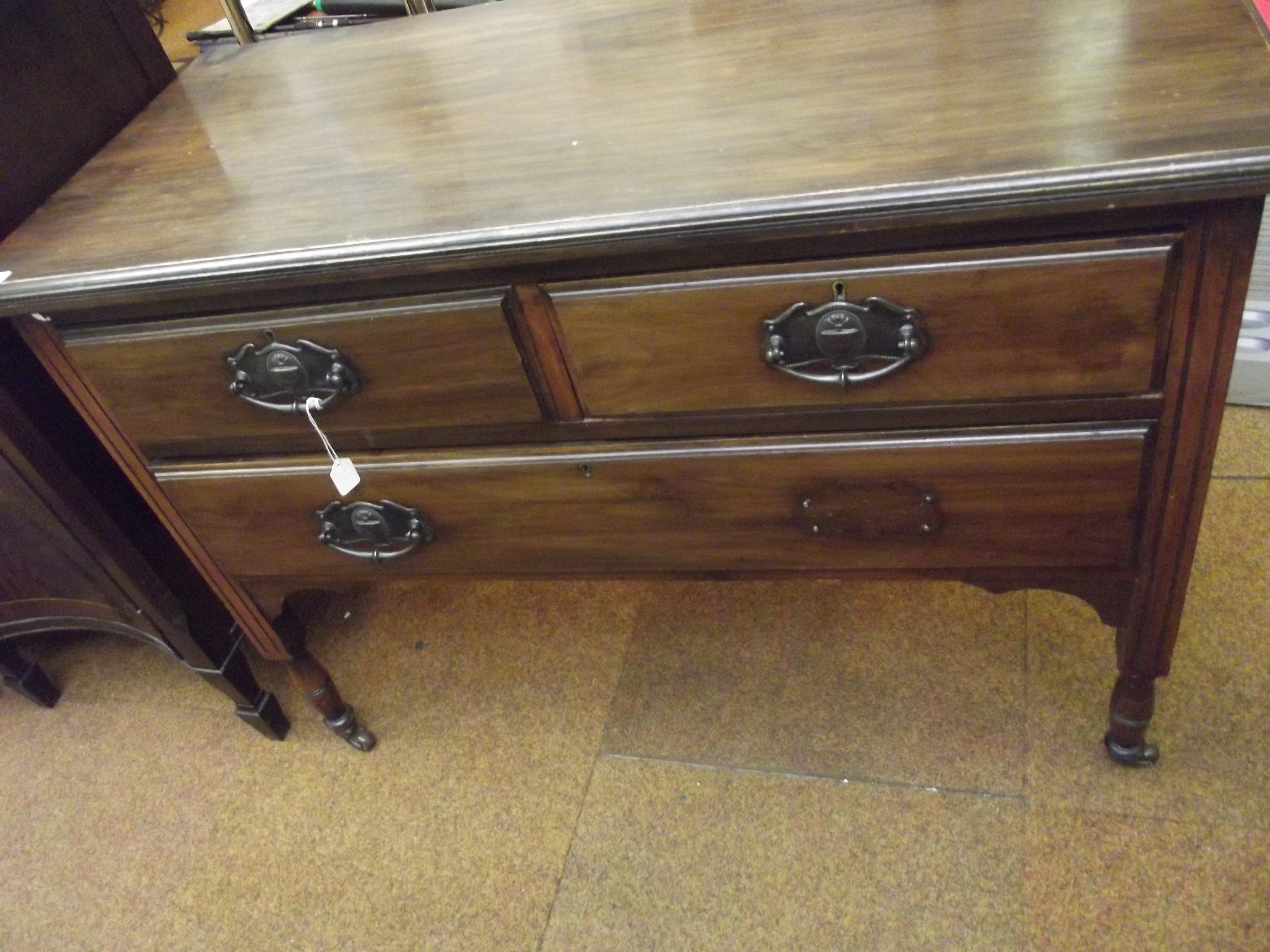 Two over one Victorian chest of drawers on casters